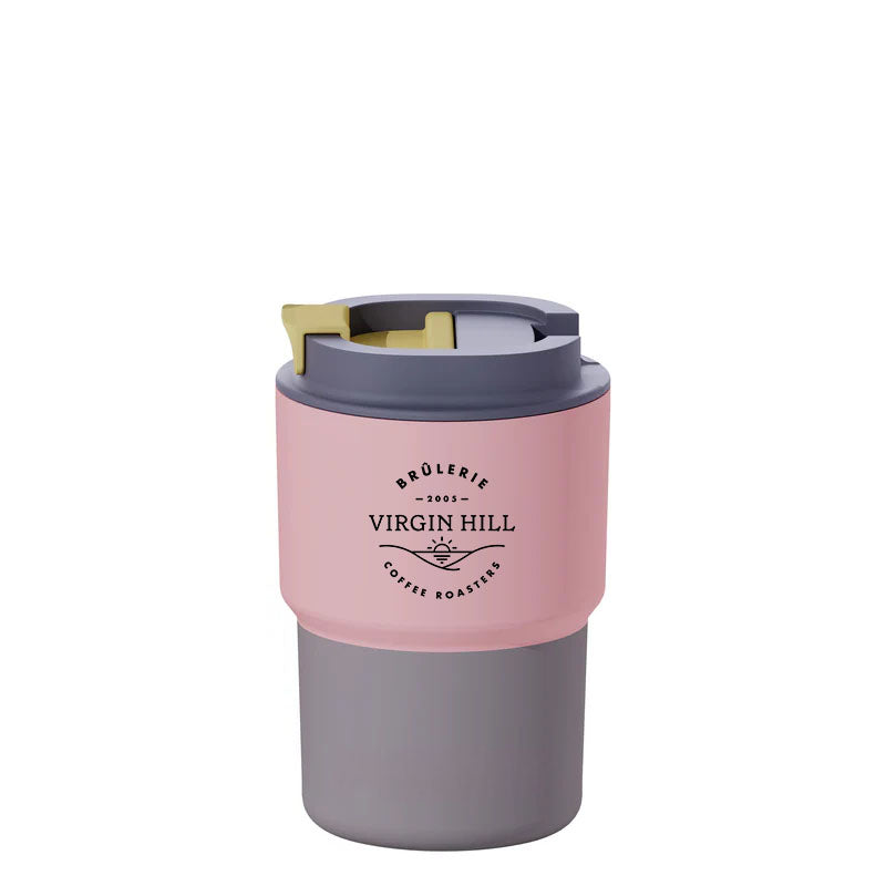 A pastel peach colored Asobu Puramic travel mug with a secure, sip-style lid and a logo on the side.