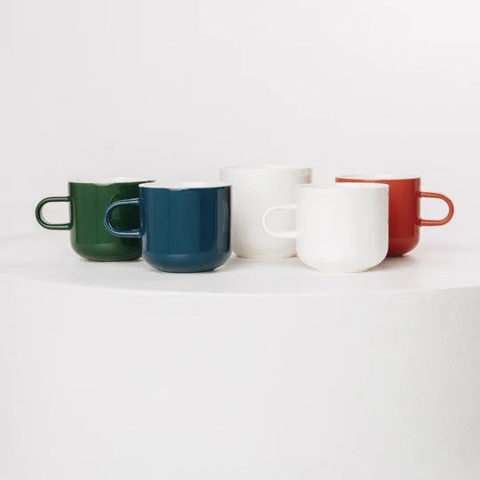 different color Acme mugs