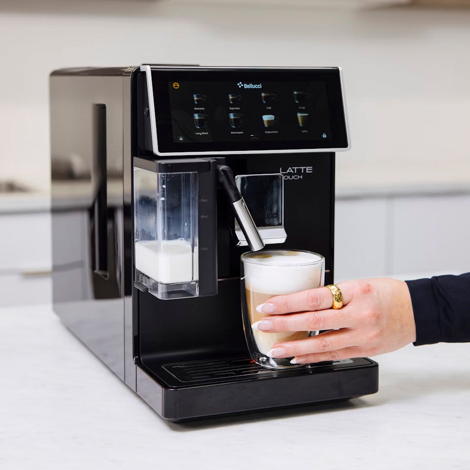Latte Touch Aspresso Machine creating a coffee drink