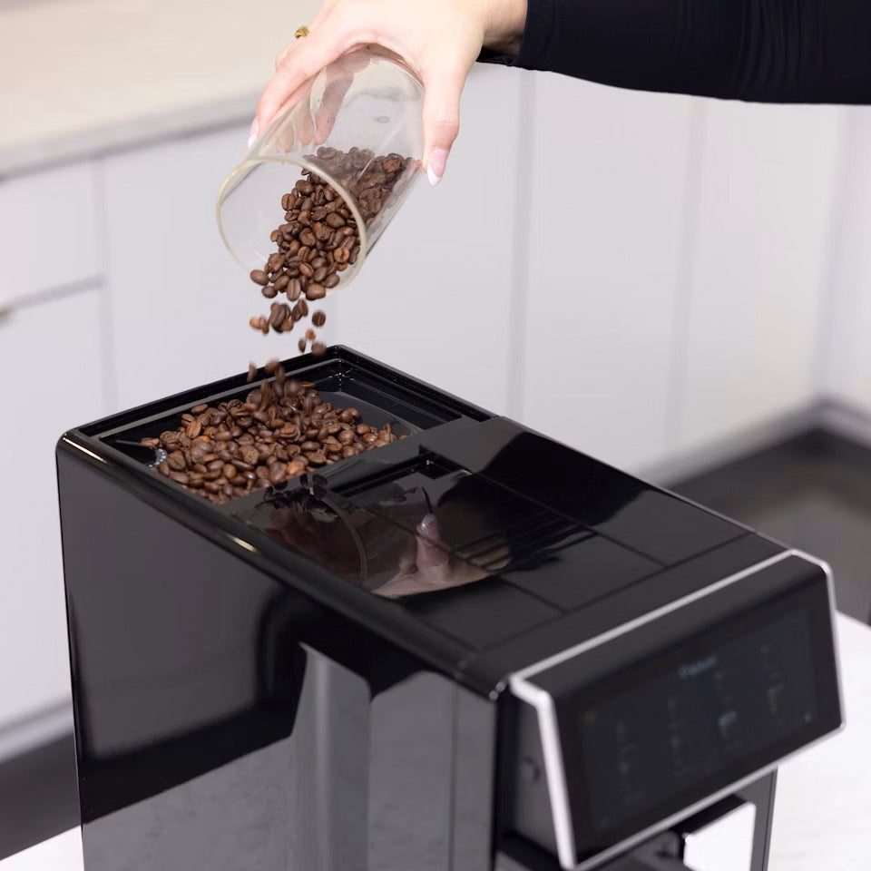 Latte Touch Aspresso Machine pouring coffee