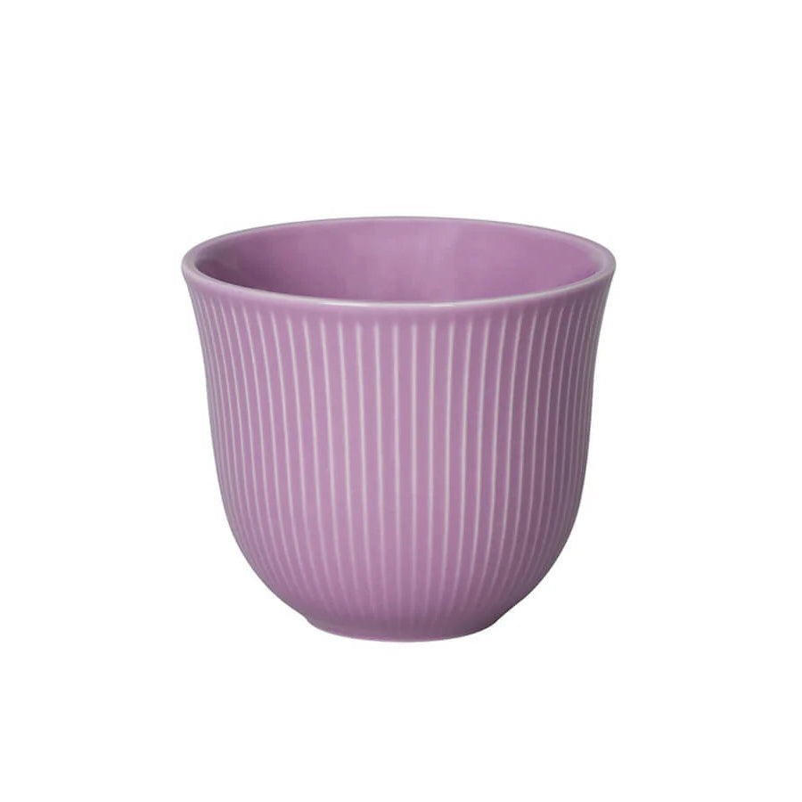 Purple textured cup on a white background