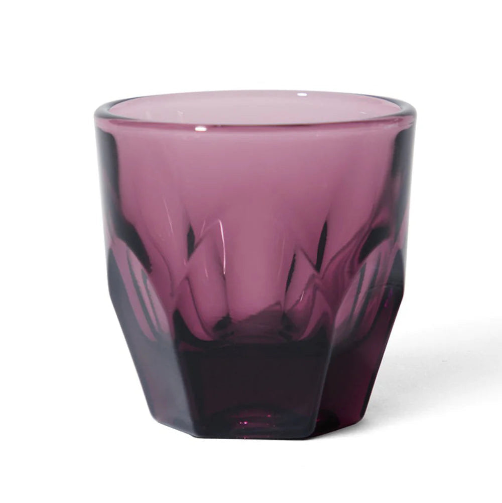 Purple glass vase with a textured surface on a white background