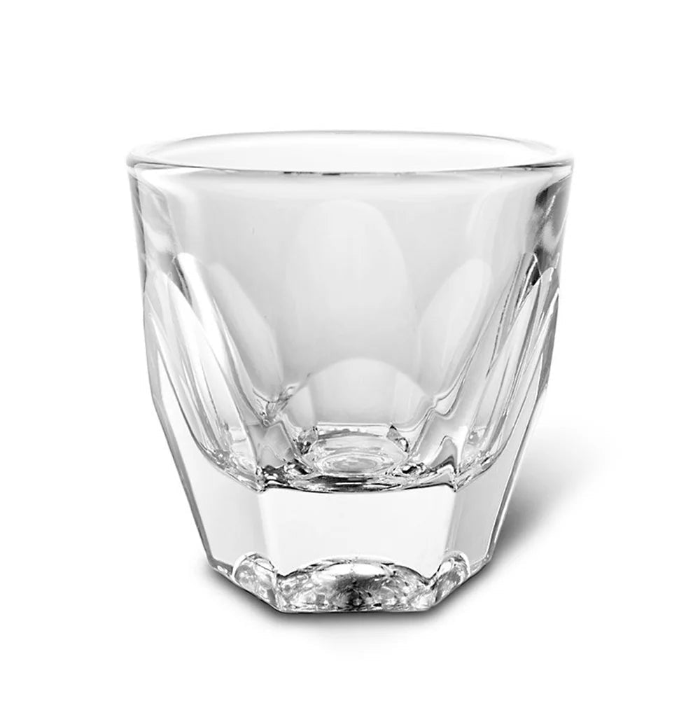 Clear glass tumbler on a white background